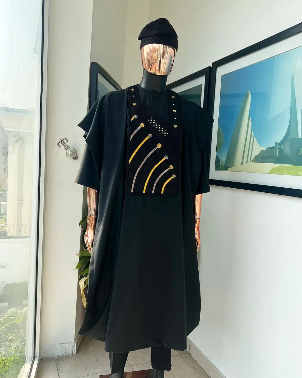A Charcoal black, a thrown javelin metallic wire embroidery details agbada, 3/4 sleeve kaftan & sokoto