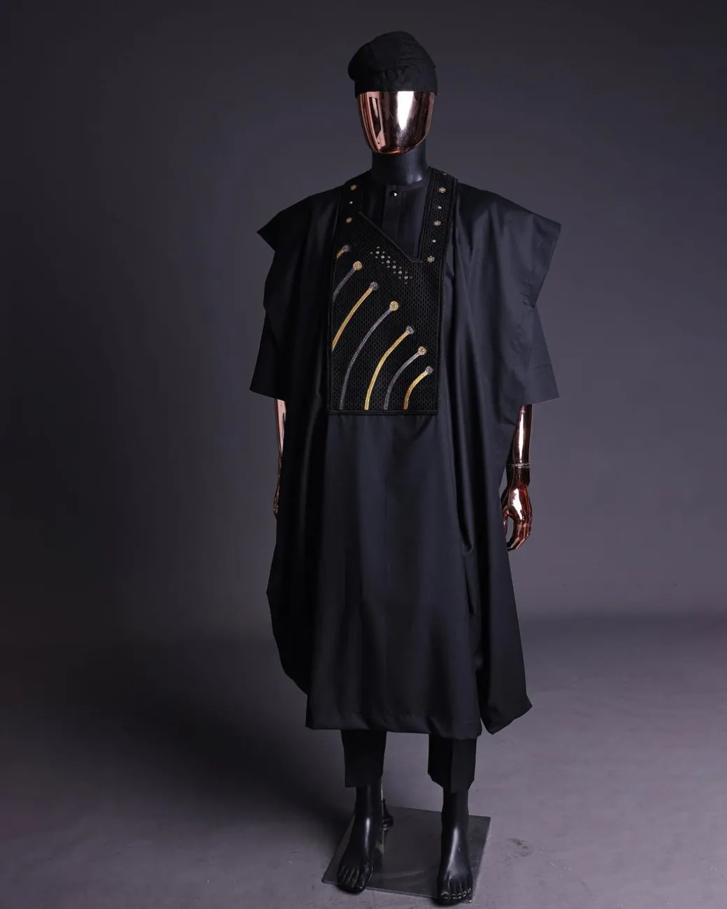 A Charcoal black, a thrown javelin metallic wire embroidery details agbada, 3/4 sleeve kaftan & sokoto