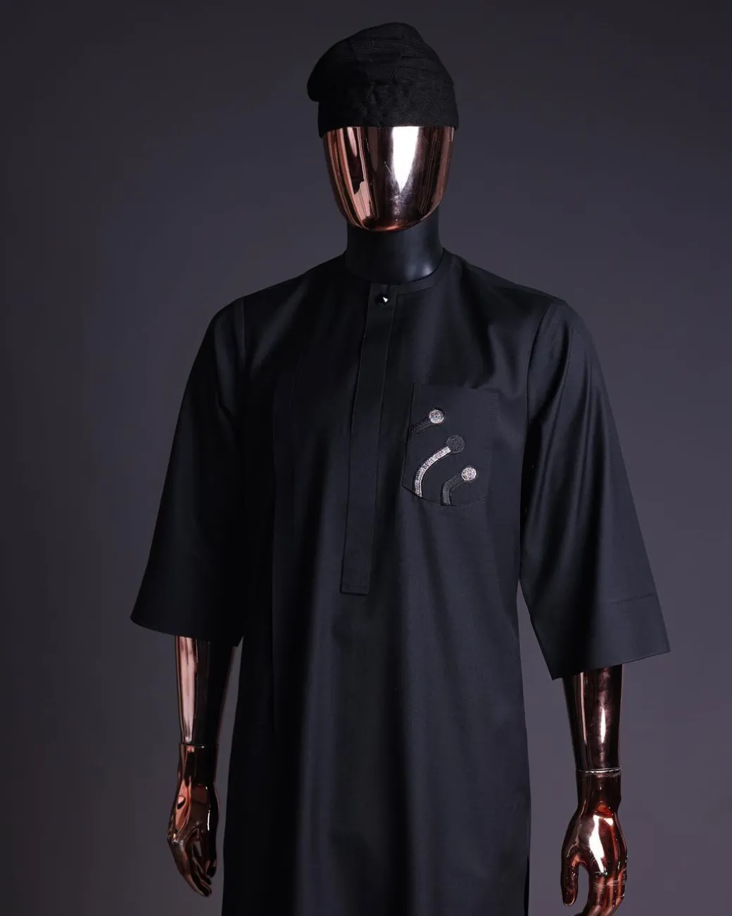 A Charcoal black, a thrown javelin metallic wire embroidery details agbada, 3/4 sleeve kaftan & sokoto