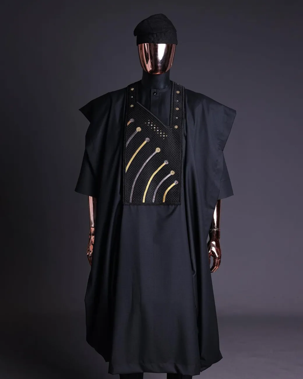 A Charcoal black, a thrown javelin metallic wire embroidery details agbada, 3/4 sleeve kaftan & sokoto