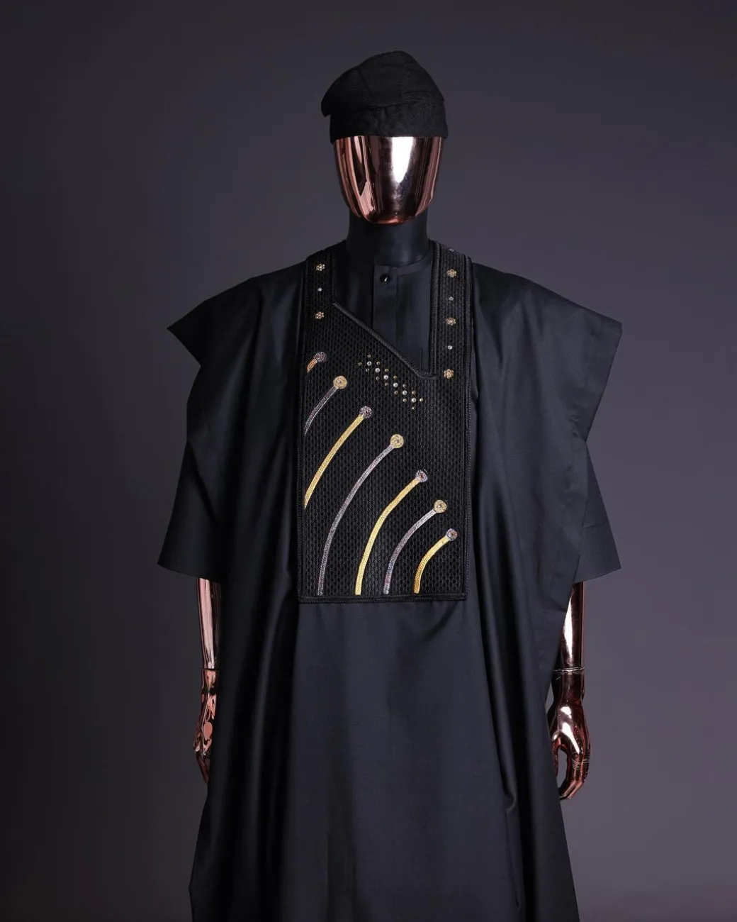 A Charcoal black, a thrown javelin metallic wire embroidery details agbada, 3/4 sleeve kaftan & sokoto