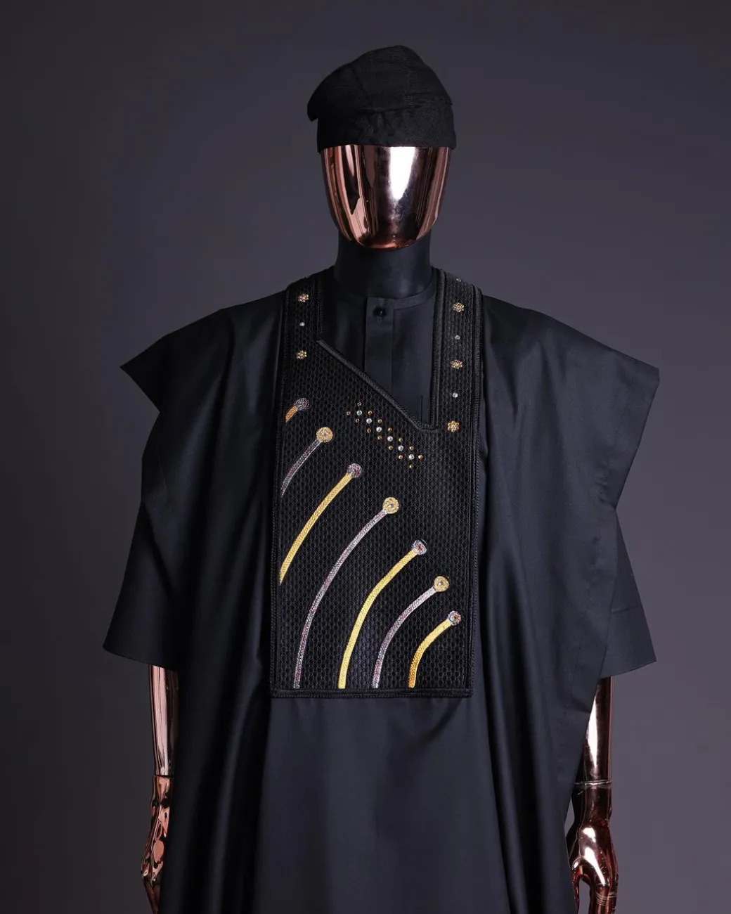 A Charcoal black, a thrown javelin metallic wire embroidery details agbada, 3/4 sleeve kaftan & sokoto