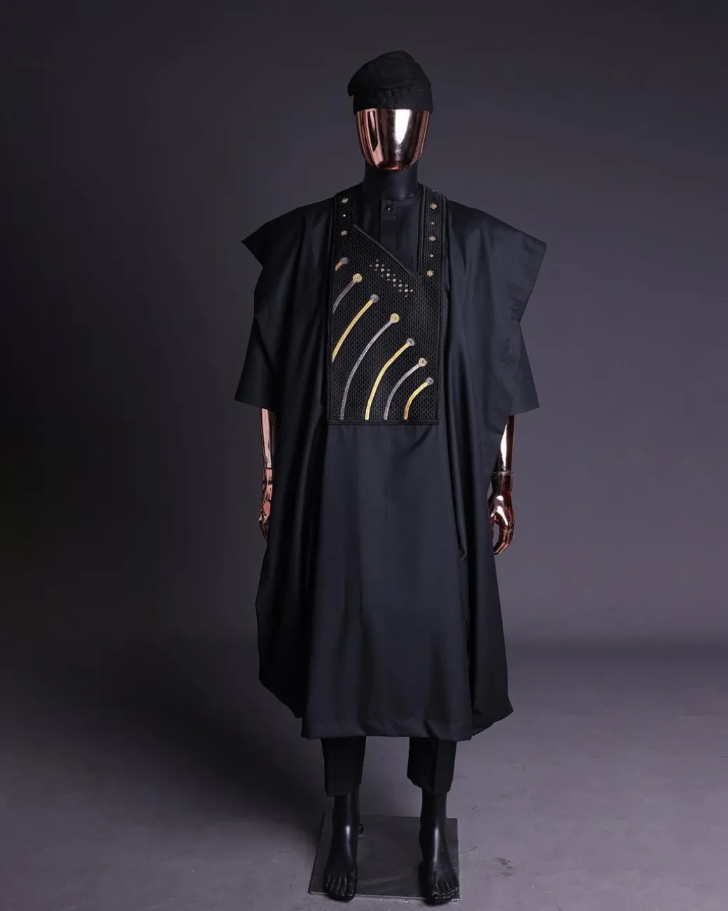 A Charcoal black, a thrown javelin metallic wire embroidery details agbada, 3/4 sleeve kaftan & sokoto