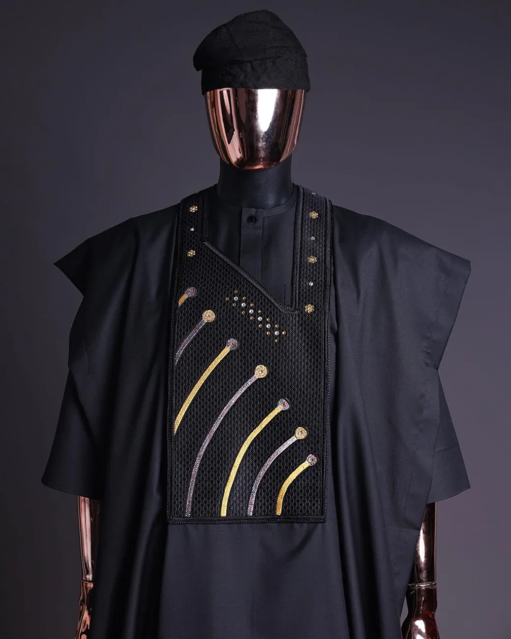 A Charcoal black, a thrown javelin metallic wire embroidery details agbada, 3/4 sleeve kaftan & sokoto