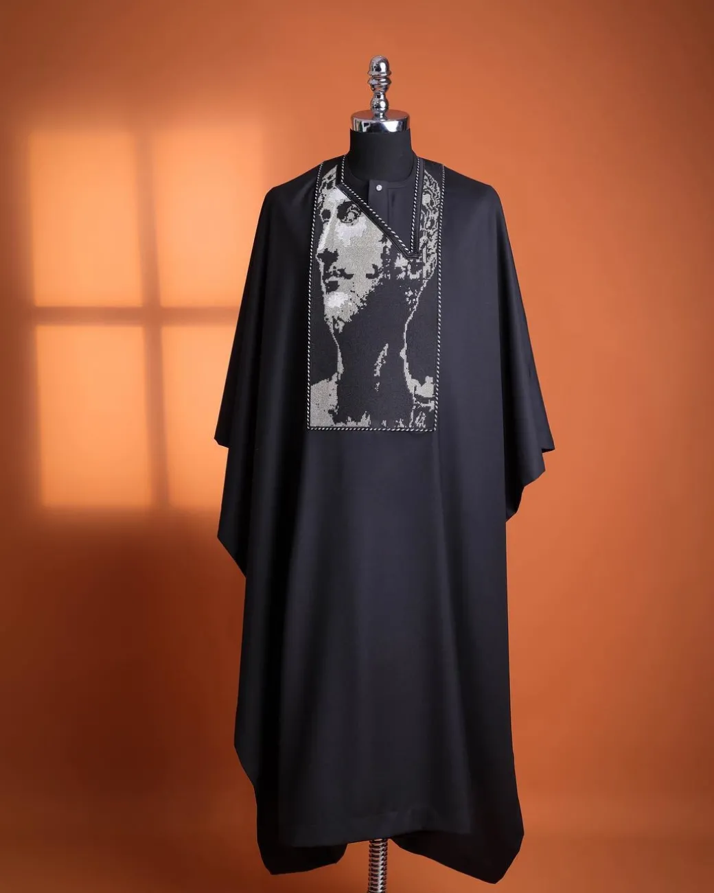 A charcoal black, Alexander 3 portrait embroidery details agbada, silver clear view Swarovski buttons on 3/4 sleeve kaftan & sokoto