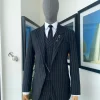 A charcoal black & white pencil stripe Jorgecarli ceremonial super 140’s “Board Room” notch lapel patch pocket suit