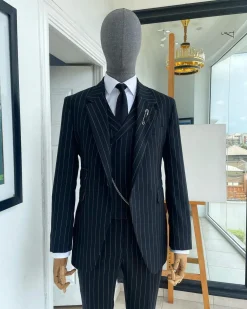 A charcoal black & white pencil stripe Jorgecarli ceremonial super 140’s “Board Room” notch lapel patch pocket suit