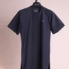 A charcoal black and admiral blue pencil stripe, invisible neckline zip line with layered front flap details, short sleeve African senator kaftan native.