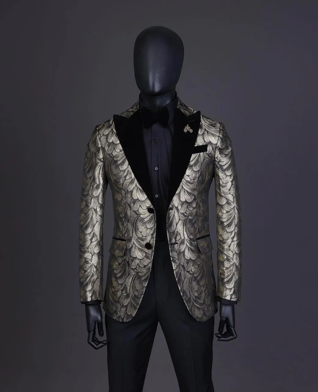 A Charcoal Black And Gold Splash, Peak Lapel Tuxedo Suit.