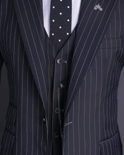 A charcoal black and ivory pencil stripe, notch lapel, knitted one button suit