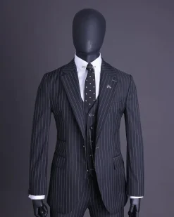 A charcoal black and ivory pencil stripe, notch lapel, knitted one button suit
