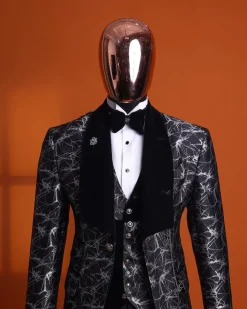 A charcoal black and silver spiral jacquard, shawl lapel tuxedo suit