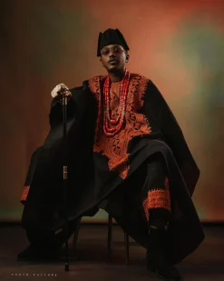 A Charcoal black, Arewa embroidery, front cut towards the back, traditional Agbada