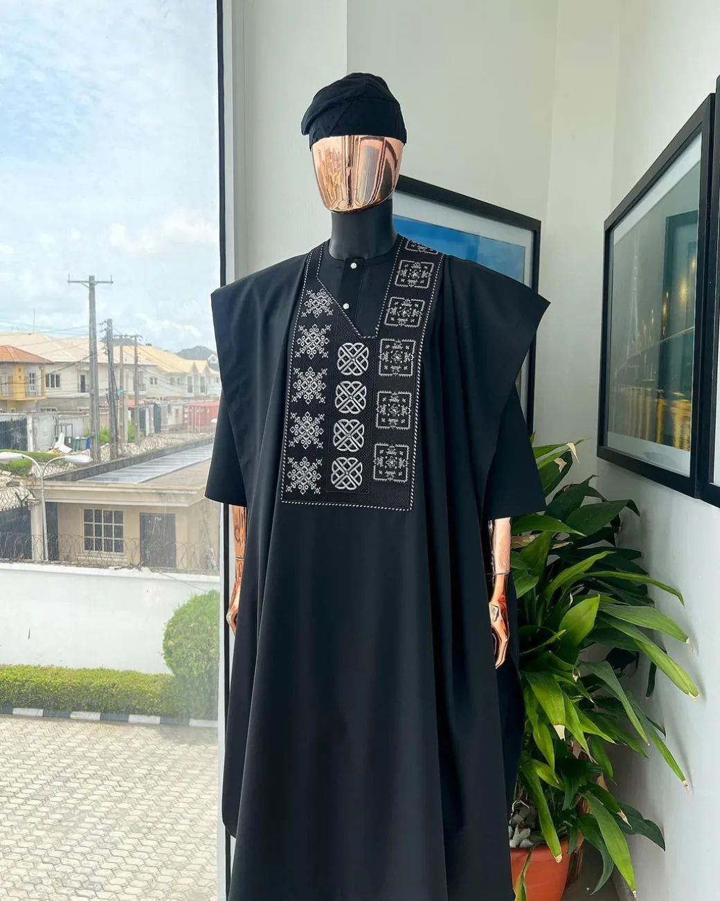 A Charcoal black, “Arewa” interwoven pattern embroidery details Agbada