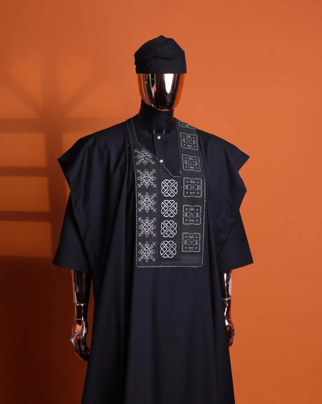 A Charcoal black, “Arewa” interwoven pattern embroidery details Agbada