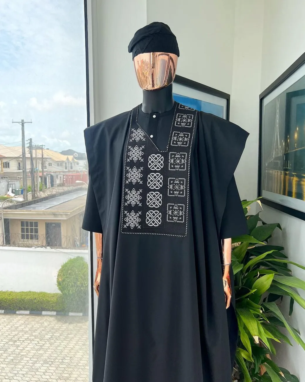 A Charcoal black, “Arewa” interwoven pattern embroidery details Agbada