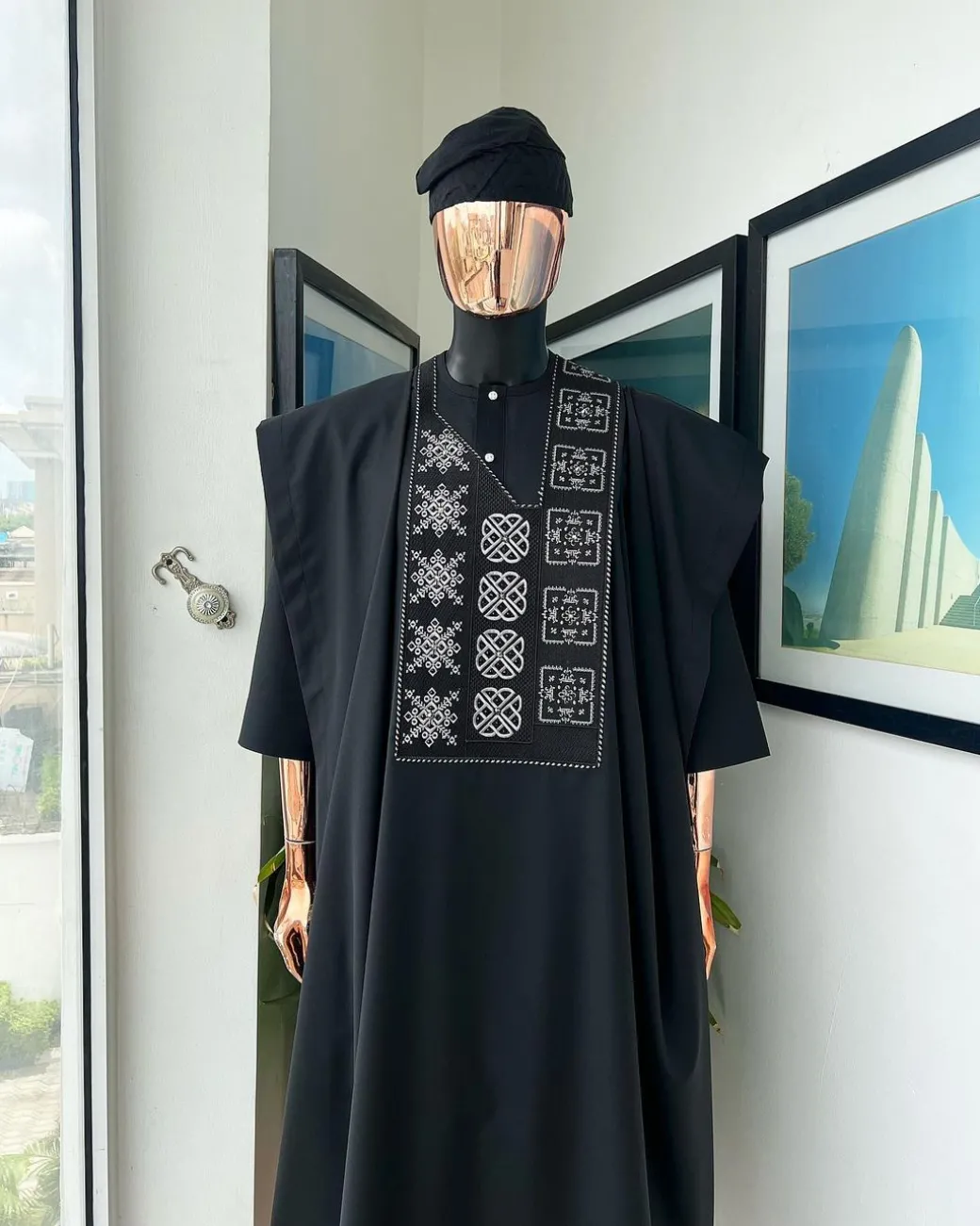 A Charcoal black, “Arewa” interwoven pattern embroidery details Agbada
