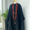 A charcoal black aso oke agbada with box patter embroidery design
