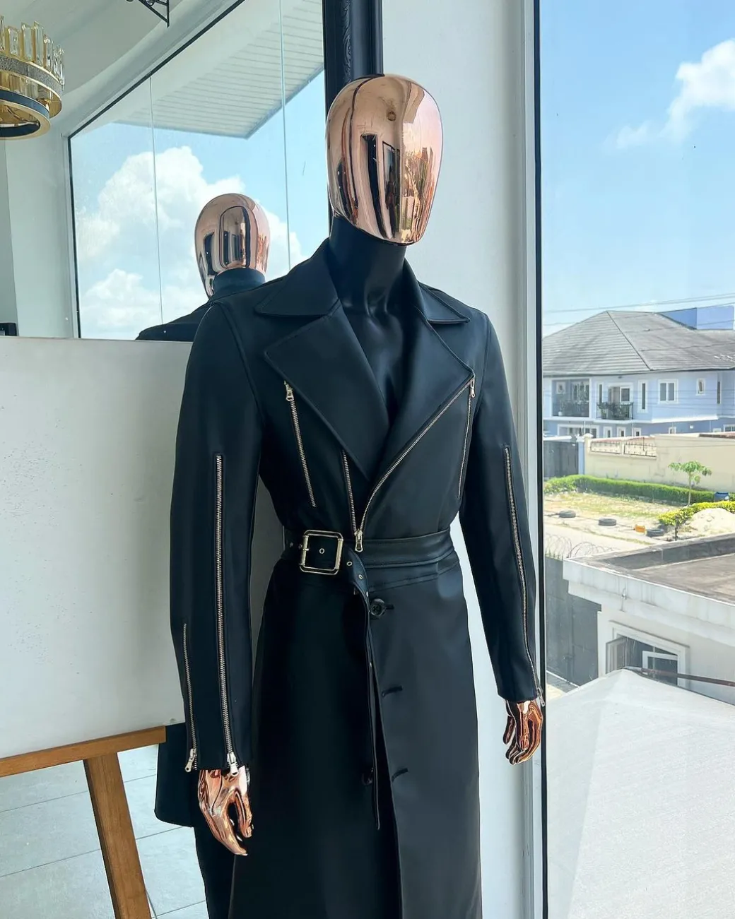 A Charcoal Black “Bikers” leather double breasted layered trench Jacket, belt and leather trousers.