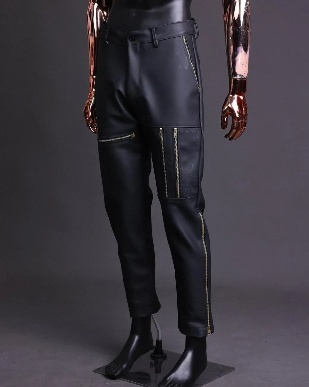A Charcoal Black “Bikers” leather double breasted layered trench Jacket, belt and leather trousers.