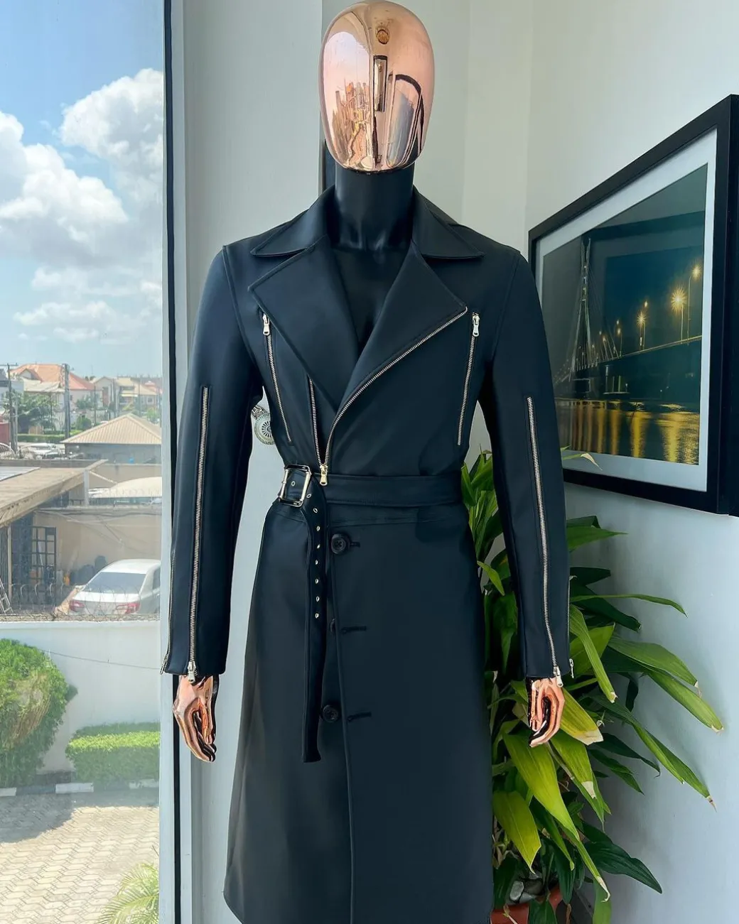 A Charcoal Black “Bikers” leather double breasted layered trench Jacket, belt and leather trousers.