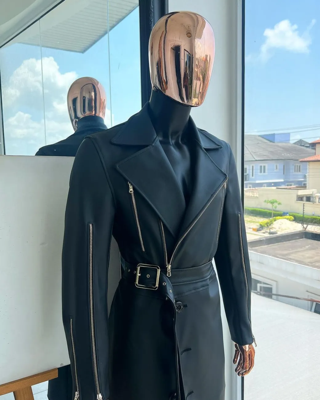 A Charcoal Black “Bikers” leather double breasted layered trench Jacket, belt and leather trousers.
