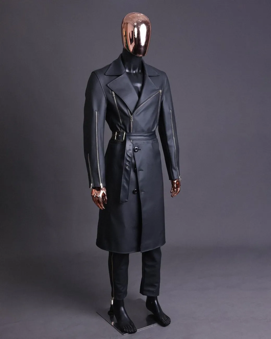 A Charcoal Black “Bikers” leather double breasted layered trench Jacket, belt and leather trousers.