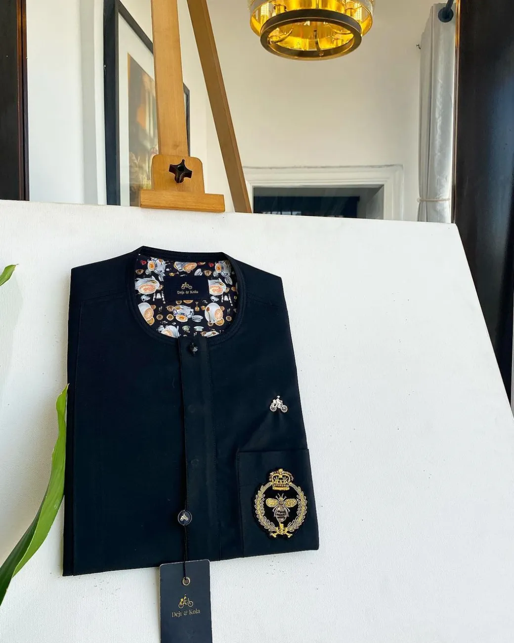 A charcoal black, clear view black Swarovski buttons, hand embroidery patch details, African traditional senator kaftan native