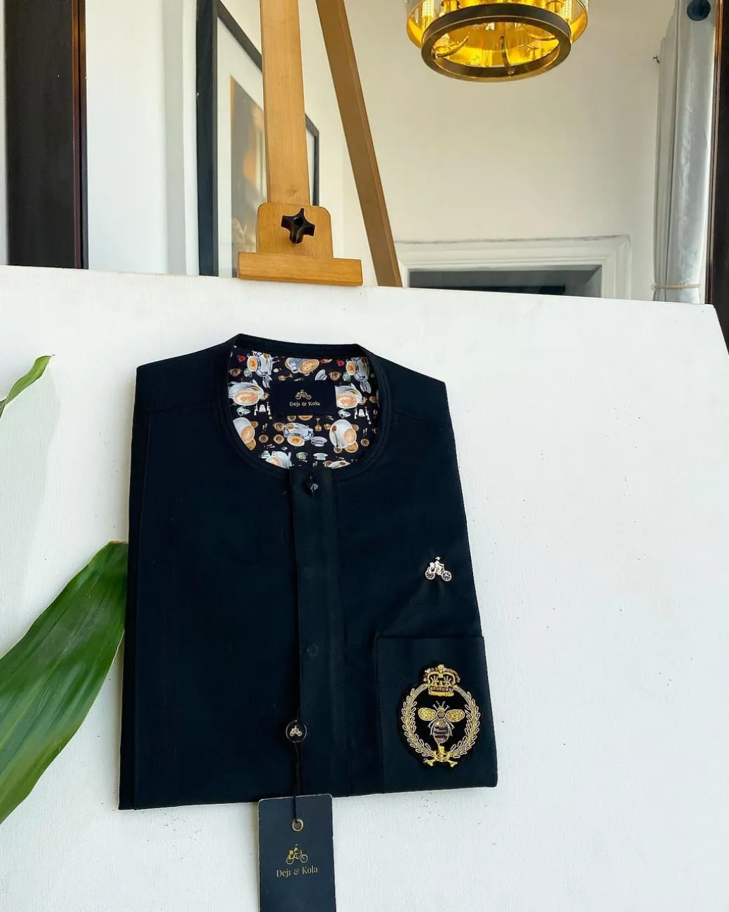 A charcoal black, clear view black Swarovski buttons, hand embroidery patch details, African traditional senator kaftan native