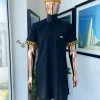 A Charcoal black, connected star gold embroidery detailing Senator Kaftan native.