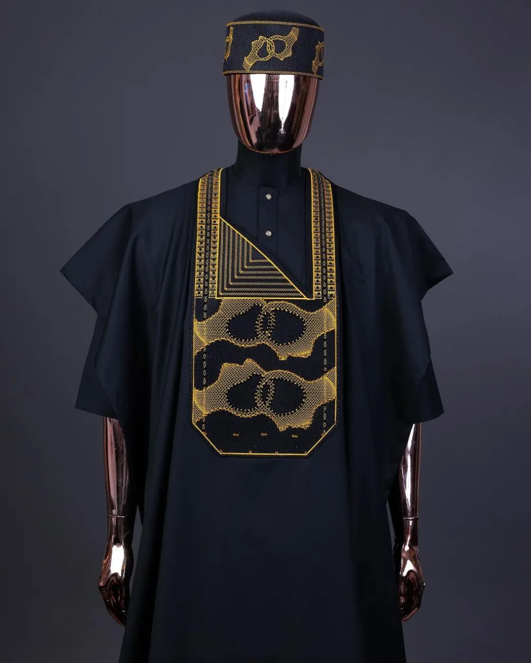 A Charcoal Black, Connected Medulla And Wooven Pattern Embroidery Agbada