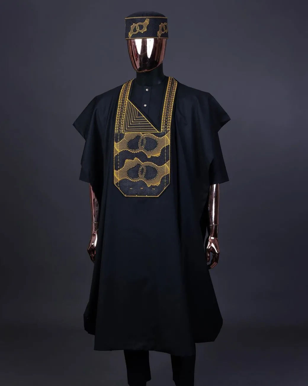 A Charcoal Black, Connected Medulla And Wooven Pattern Embroidery Agbada