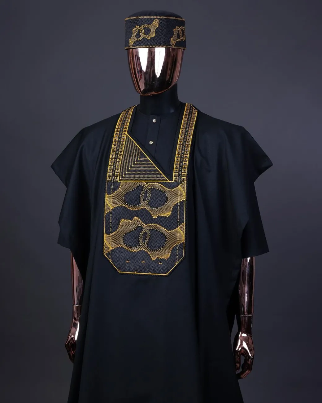 A Charcoal Black, Connected Medulla And Wooven Pattern Embroidery Agbada