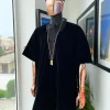 A charcoal black “daftan” from soaked Italian velvet