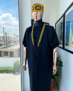 A charcoal black dagbtan, connected star gold embroidery detailing senator native.