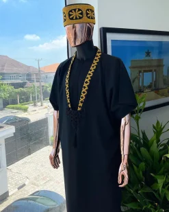 A charcoal black dagbtan, connected star gold embroidery detailing senator native.
