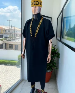 A charcoal black dagbtan, connected star gold embroidery detailing senator native.