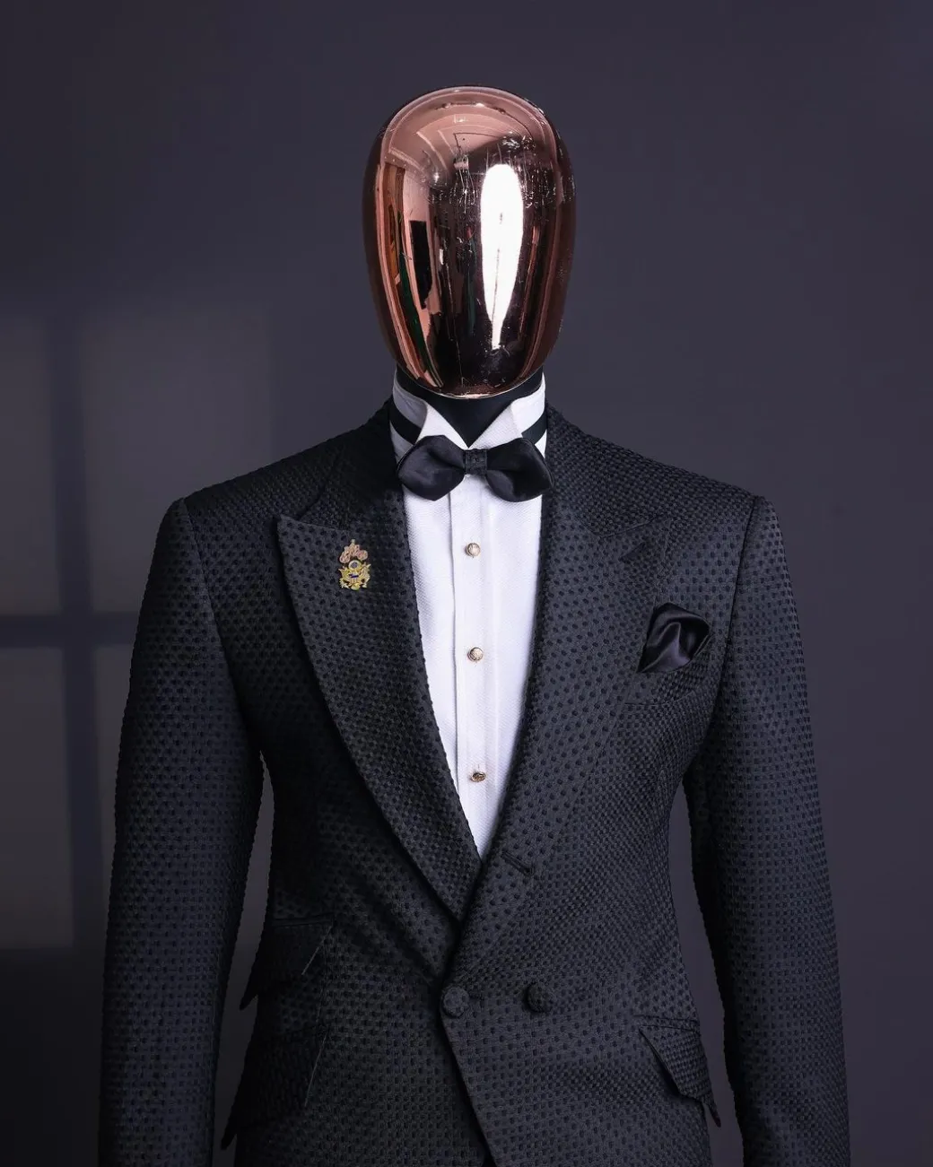 A Charcoal black, dotted jacquard, half-double-breasted suit