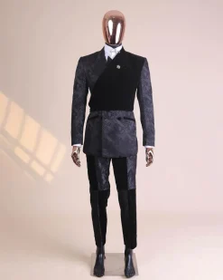 A charcoal black “equalizer” quadruple breasted, knitted, peak lapel with velvet tuxedo jacquard suit