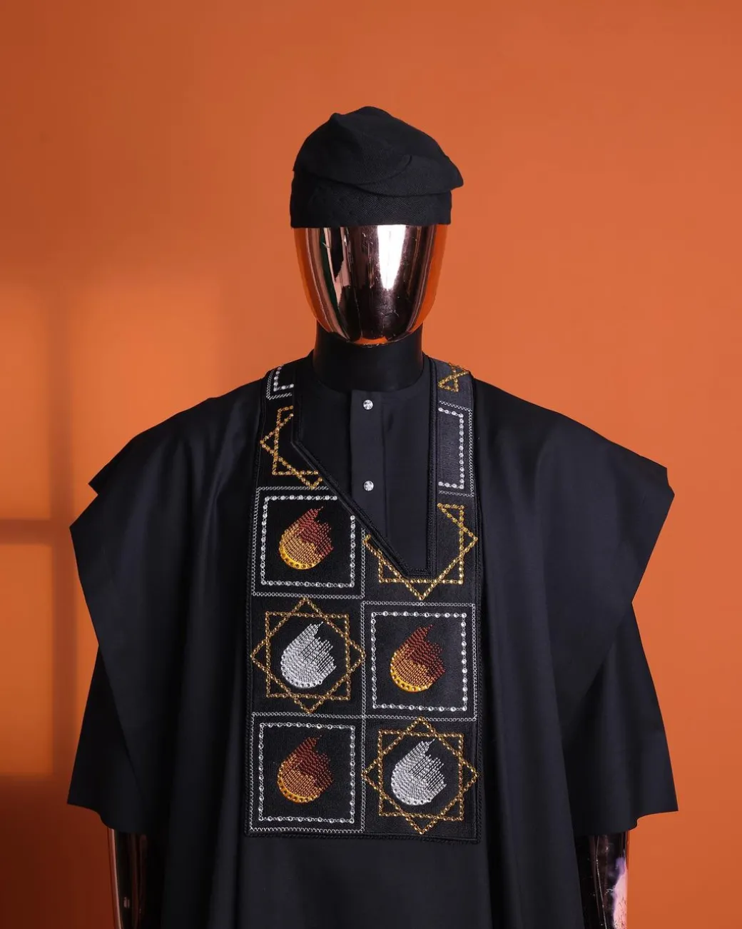 A Charcoal black, “Falling Asteroids in block” with Swarovski details embroidery Agbada.