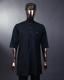 A charcoal black front flap with gold Swarovski buttons, patch pocket, and 3/4 sleeve details African senator kaftan native