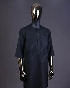 A Charcoal black front flap, blue and black pencil stripe cross-over with black Swarovski button detailing kaftan