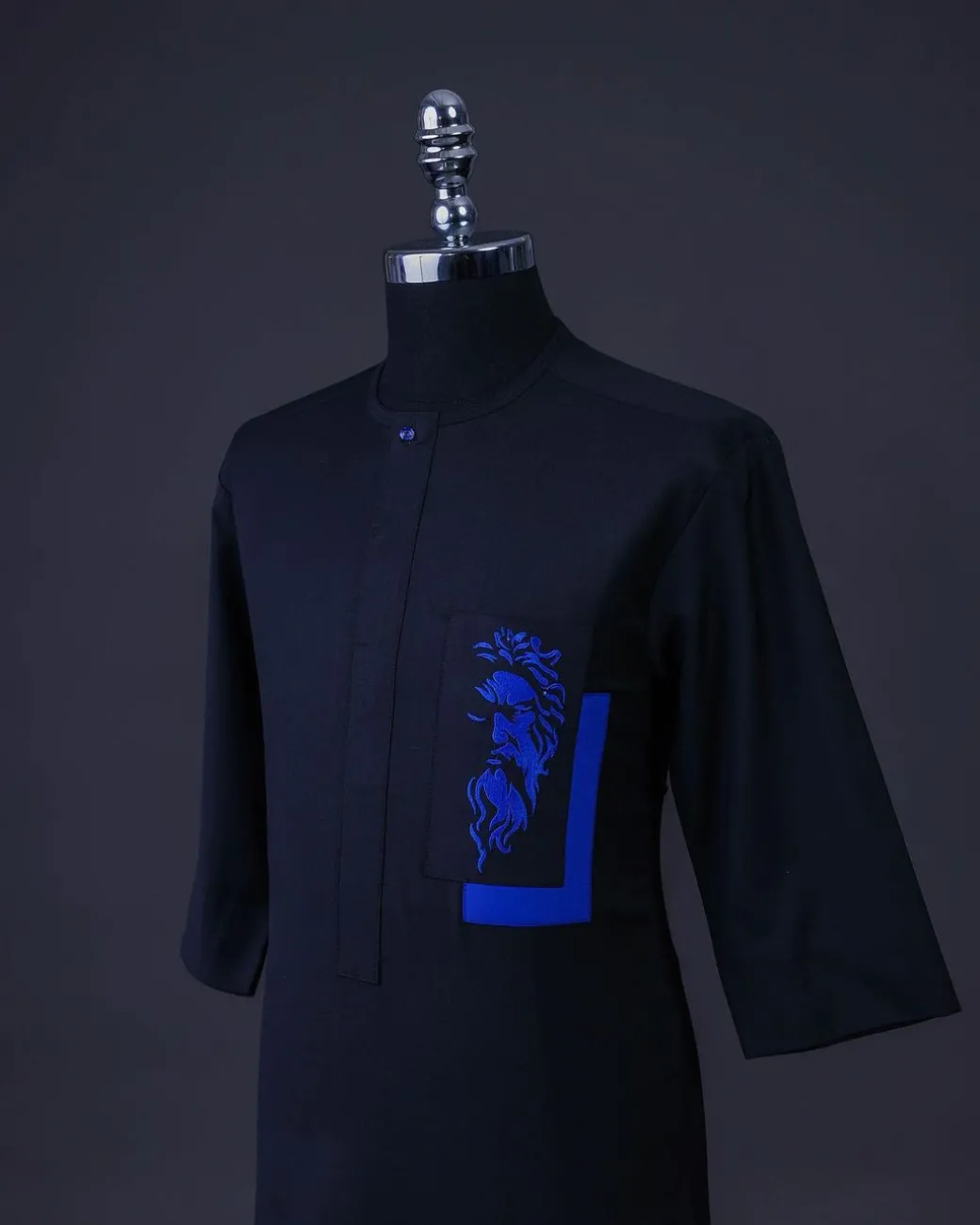 A Charcoal black, Front flap with crystals blue Swarovski buttons, Zeus embroidery, 3/4 sleeve details African senator kaftan native.