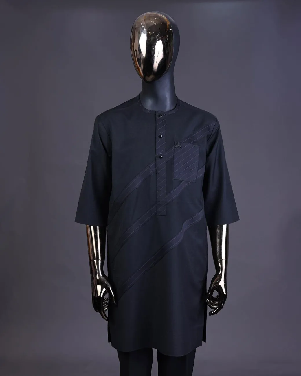 A Charcoal black front flap, blue and black pencil stripe cross-over with black Swarovski button detailing kaftan