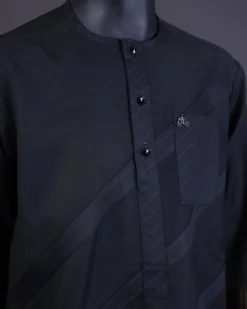 A Charcoal black front flap, blue and black pencil stripe cross-over with black Swarovski button detailing kaftan