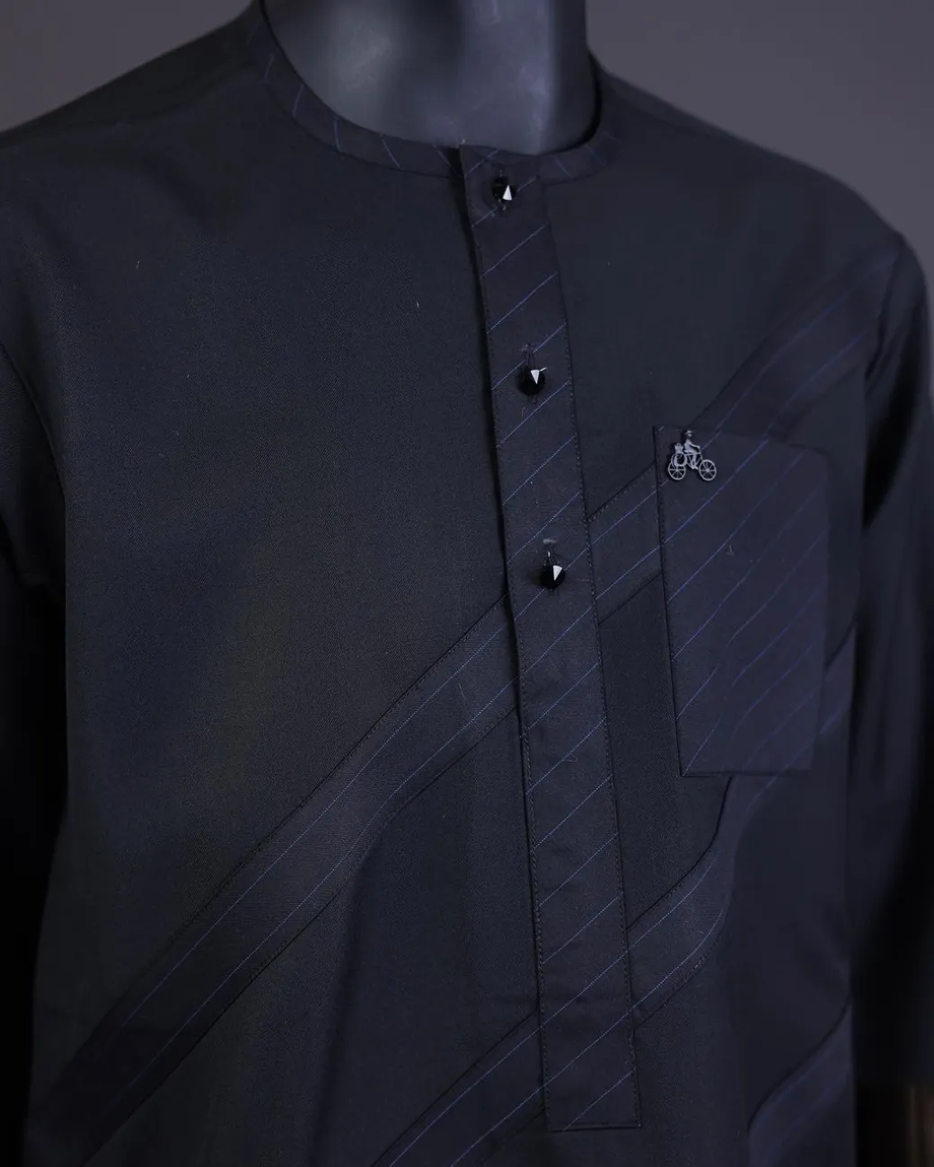 A Charcoal black front flap, blue and black pencil stripe cross-over with black Swarovski button detailing kaftan