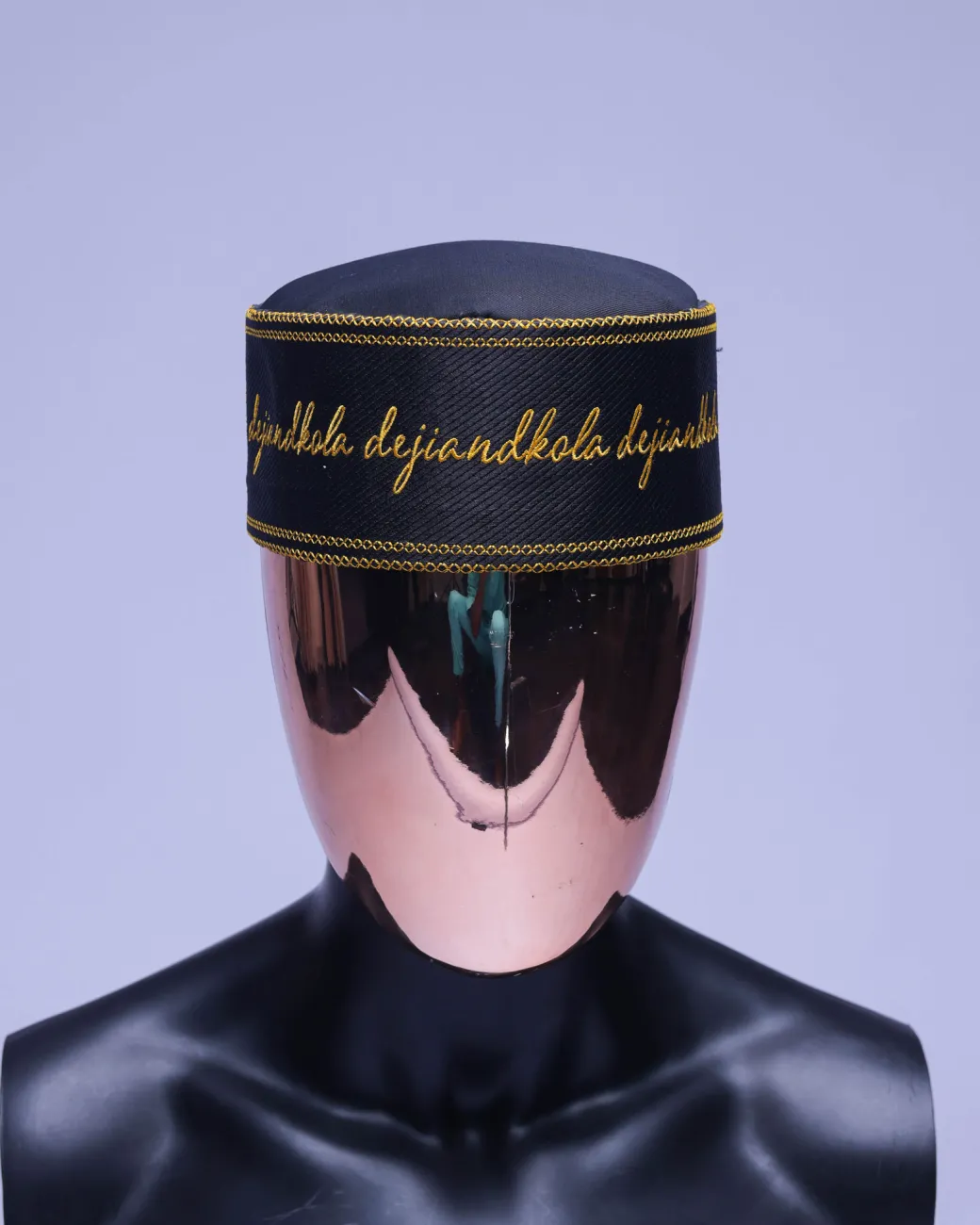 A Charcoal black, gold scritto pattered embroidery hat