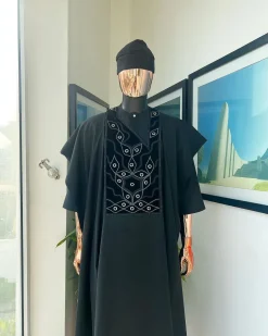 A charcoal black, grommet eyelet on root splash embroidery details agbada