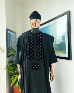 A charcoal black, grommet eyelet on dropping octa embroidery details agbada
