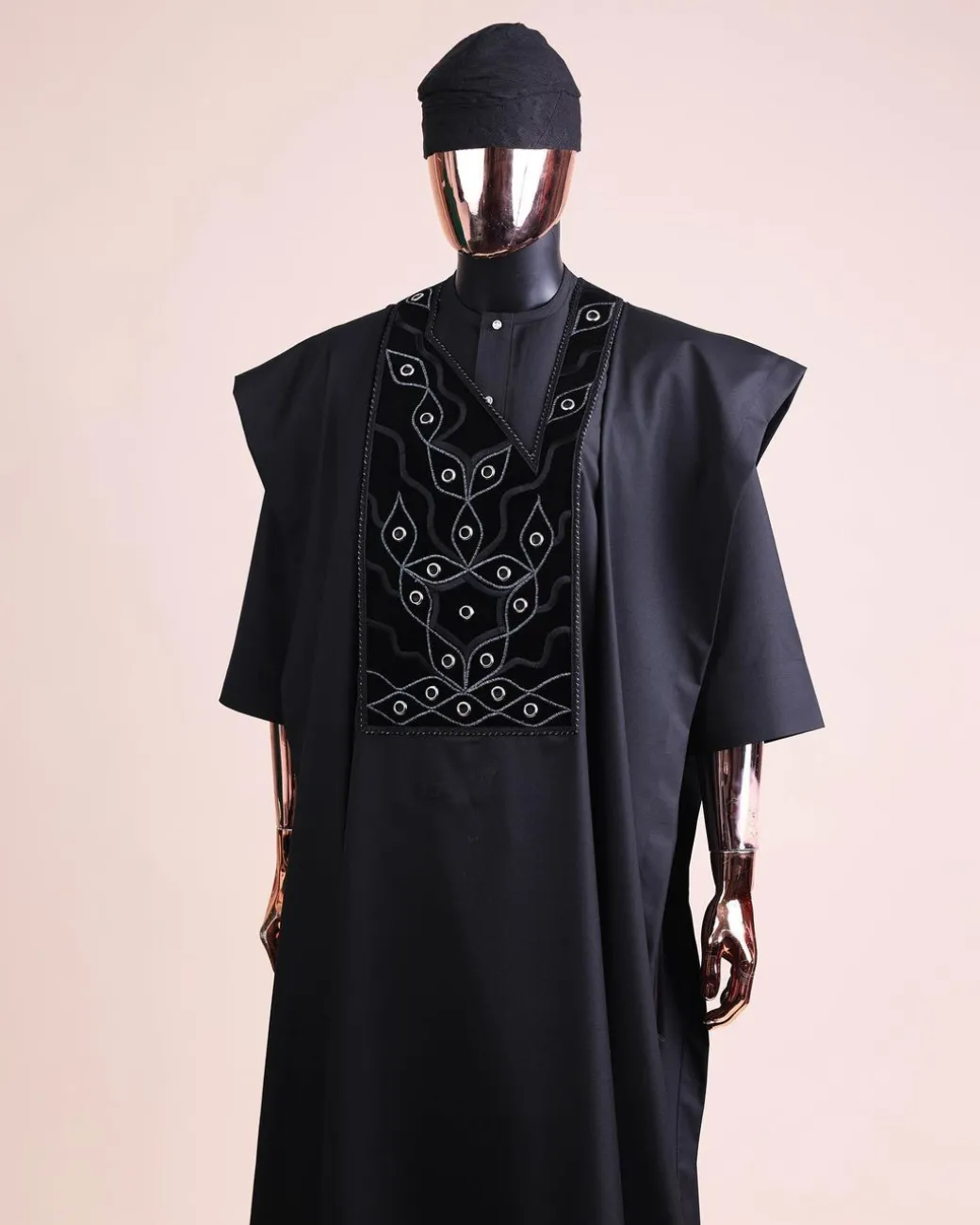 A charcoal black, grommet eyelet on root splash embroidery details agbada